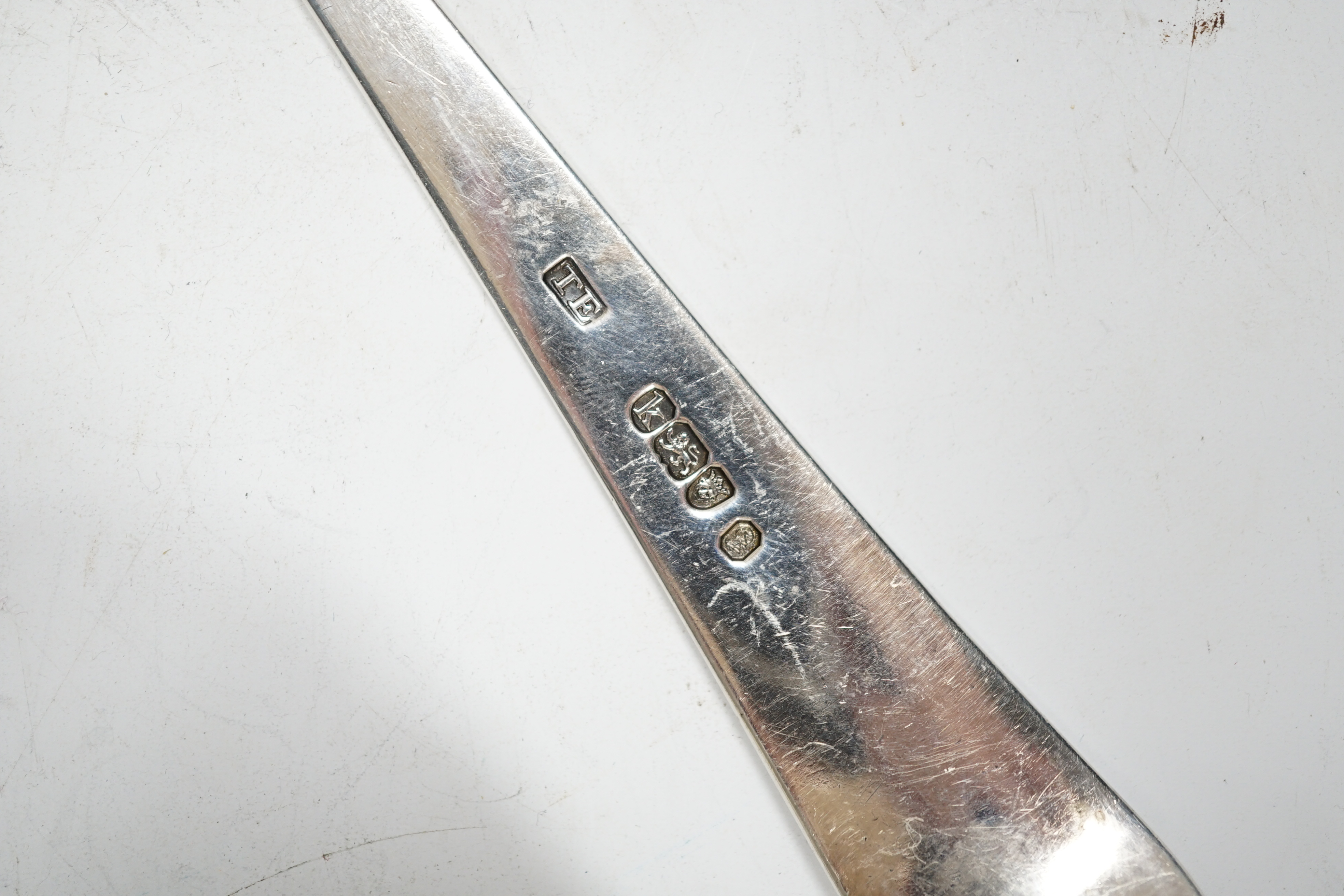 A George III silver Old English pattern basting spoon, Thomas Evans, London, 1785, 31.4cm, together with a white metal Onslow pattern soup ladle.
